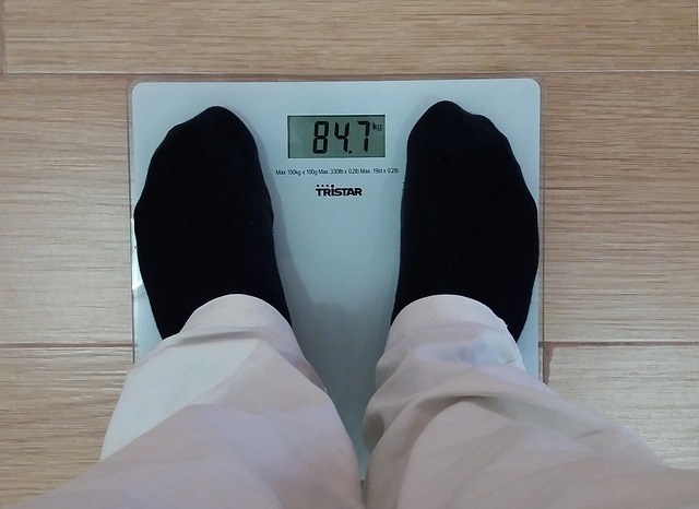 Man standing on scales